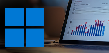 Microsoft Windows logo next to a laptop displaying a bar chart with data analytics.