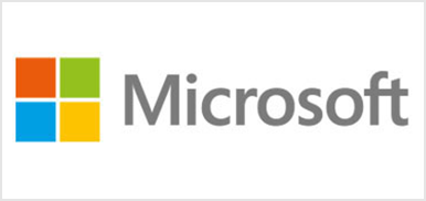 Microsoft-Logo auf weißem Hintergrund, mit vier farbigen Quadraten in einem Gittermuster.
